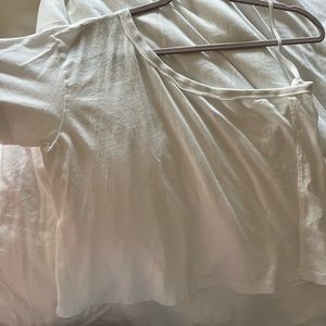 Free people we the free one shoulder top in white. Size small. Great condition